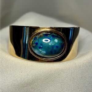 Gold Tone Bracelet with Blue Cabochon Stone